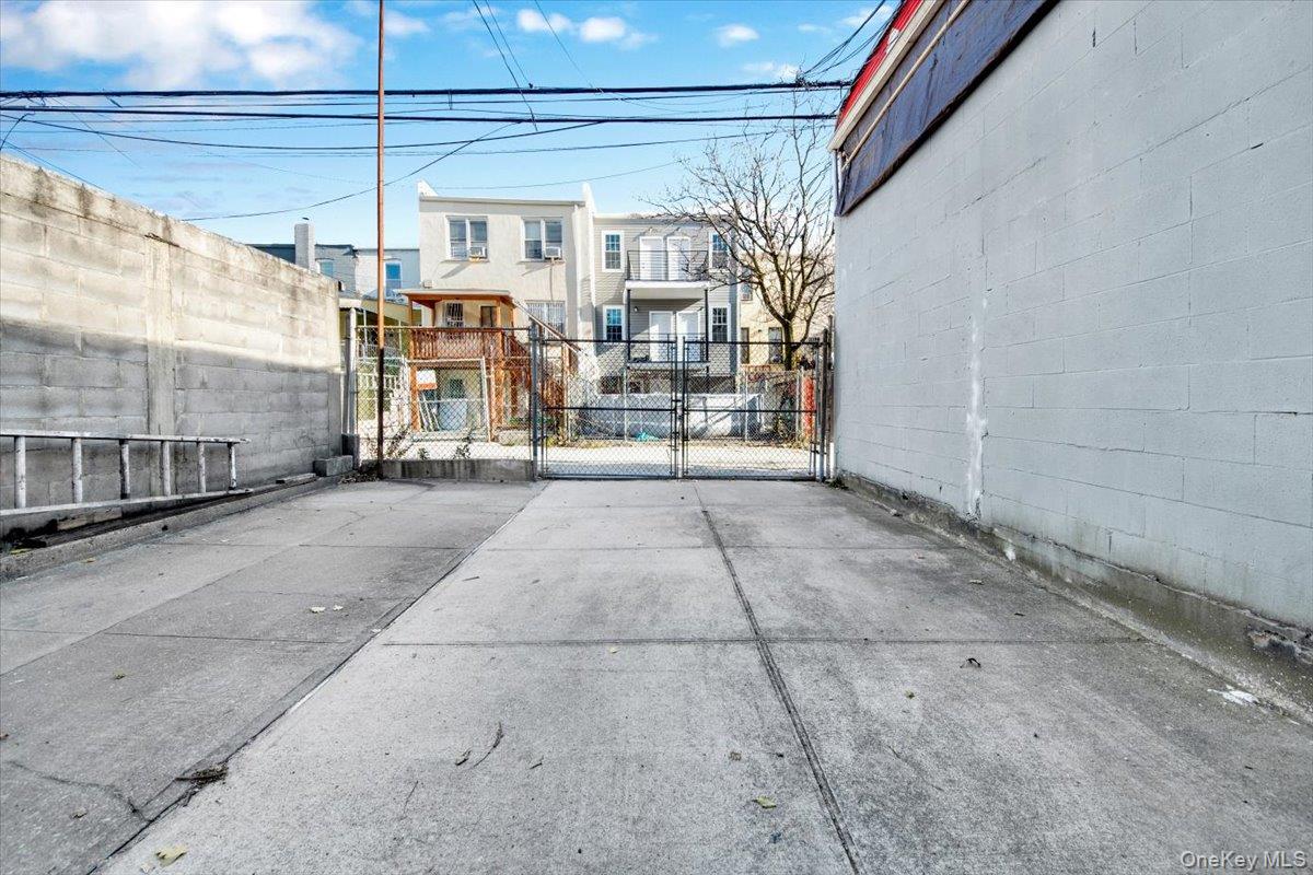1238 Colgate Avenue Bronx, NY 10472 - Photo 19 of 20 a view of a porch with a table and chairs