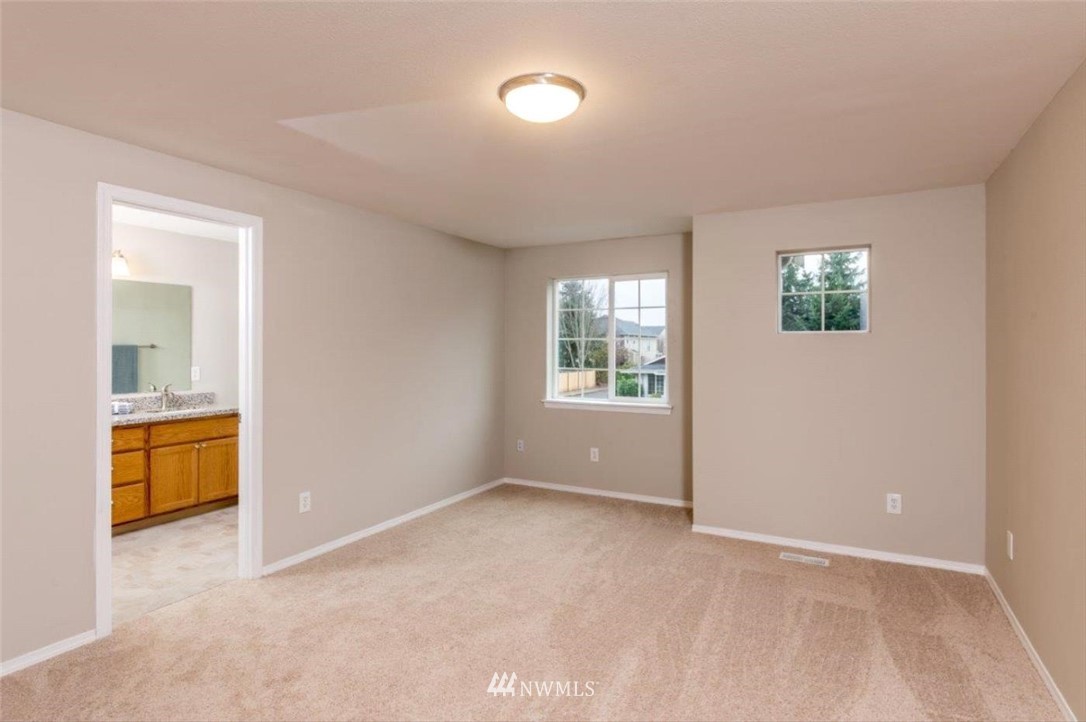 8341 49th Loop Southeast Olympia, WA 98513 - Photo 12 of 25 a view of an empty room with a window