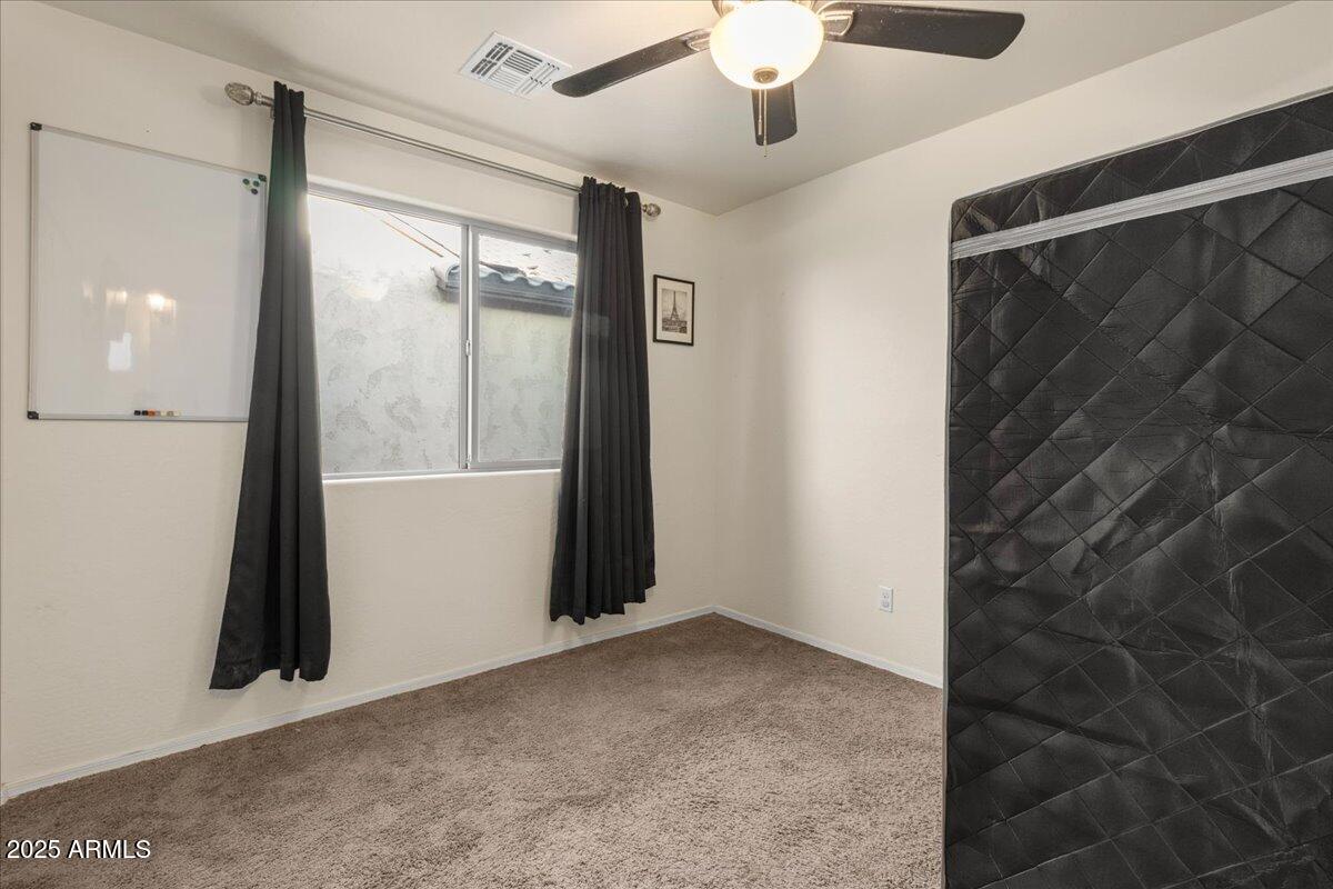 11452 West St John Road Surprise, AZ 85378 - Photo 18 of 29 a view of an empty room