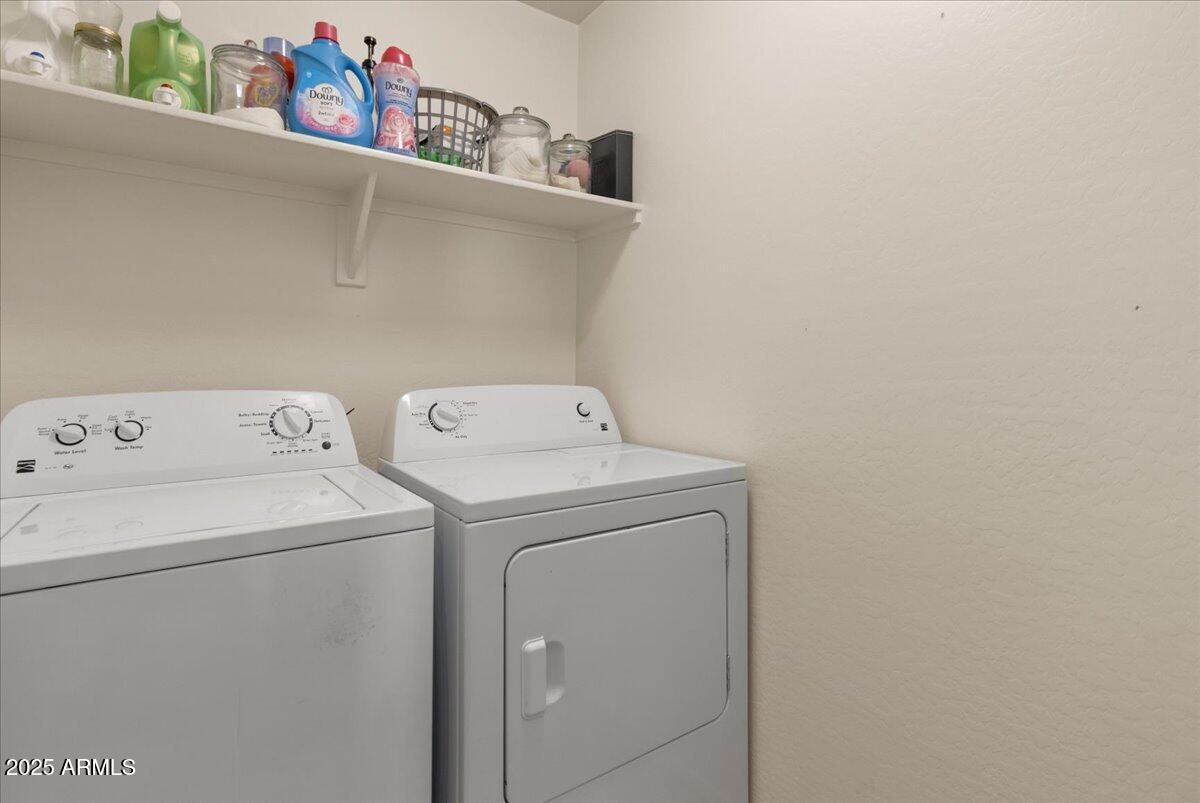 11452 West St John Road Surprise, AZ 85378 - Photo 20 of 29 a utility room with dryer and washer