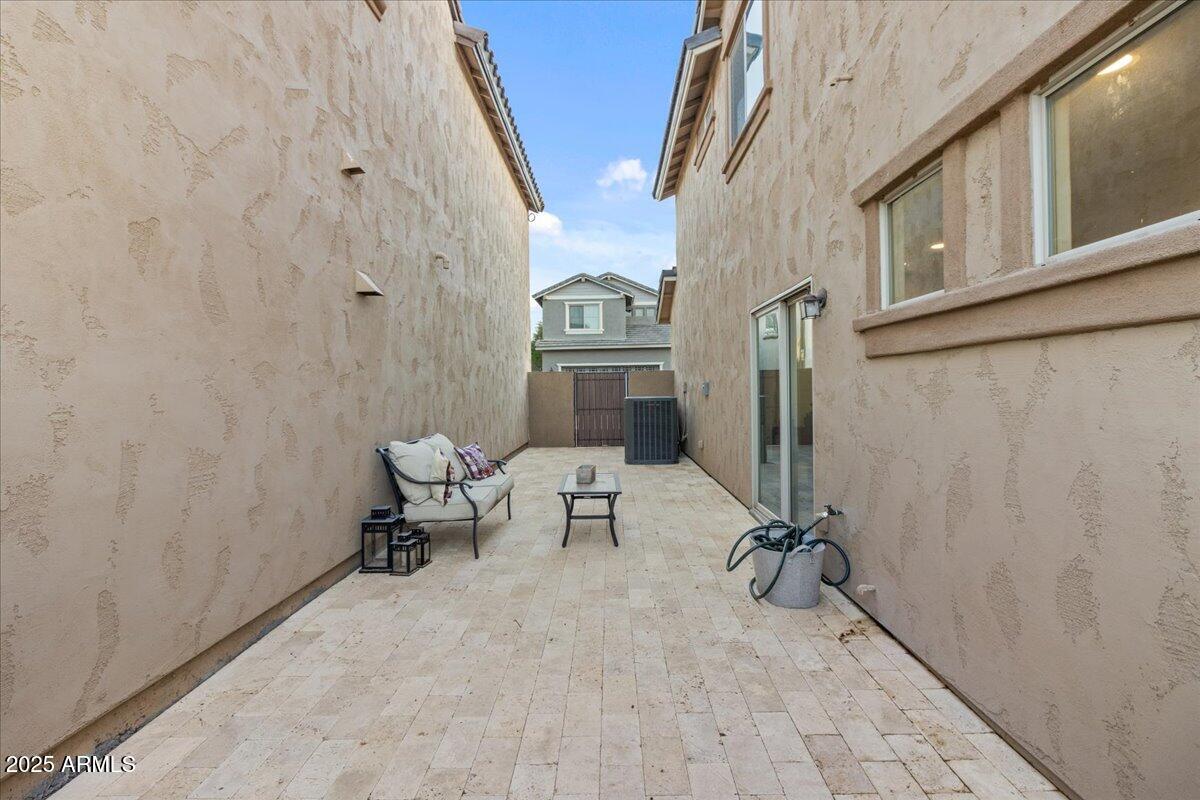 11452 West St John Road Surprise, AZ 85378 - Photo 22 of 29 a view of balcony with two chairs and a window