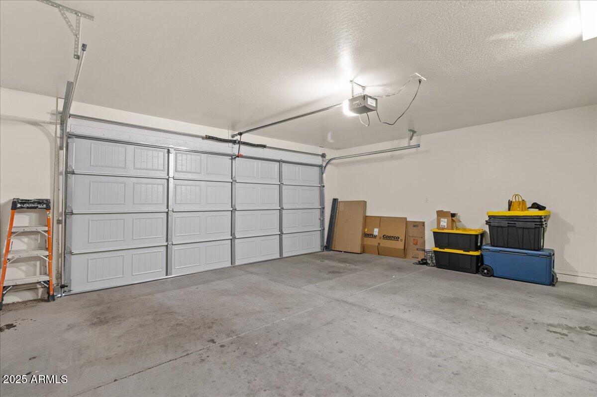 11452 West St John Road Surprise, AZ 85378 - Photo 26 of 29 a view of a garage with furniture