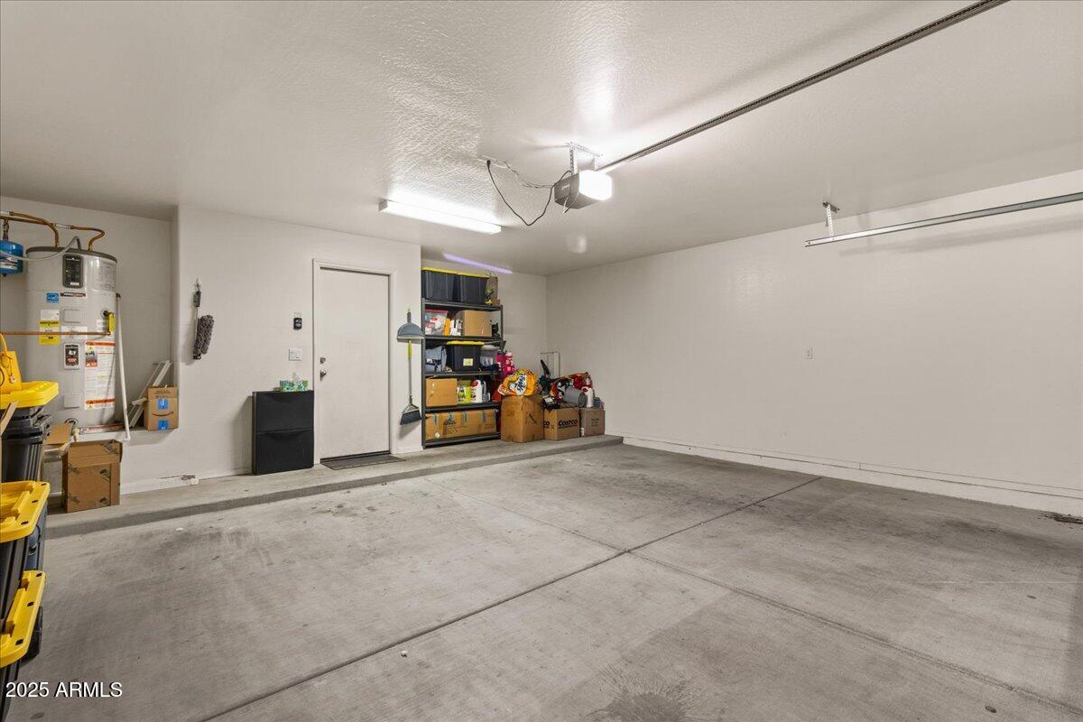 11452 West St John Road Surprise, AZ 85378 - Photo 27 of 29 a view of a livingroom with furniture and a flat screen tv