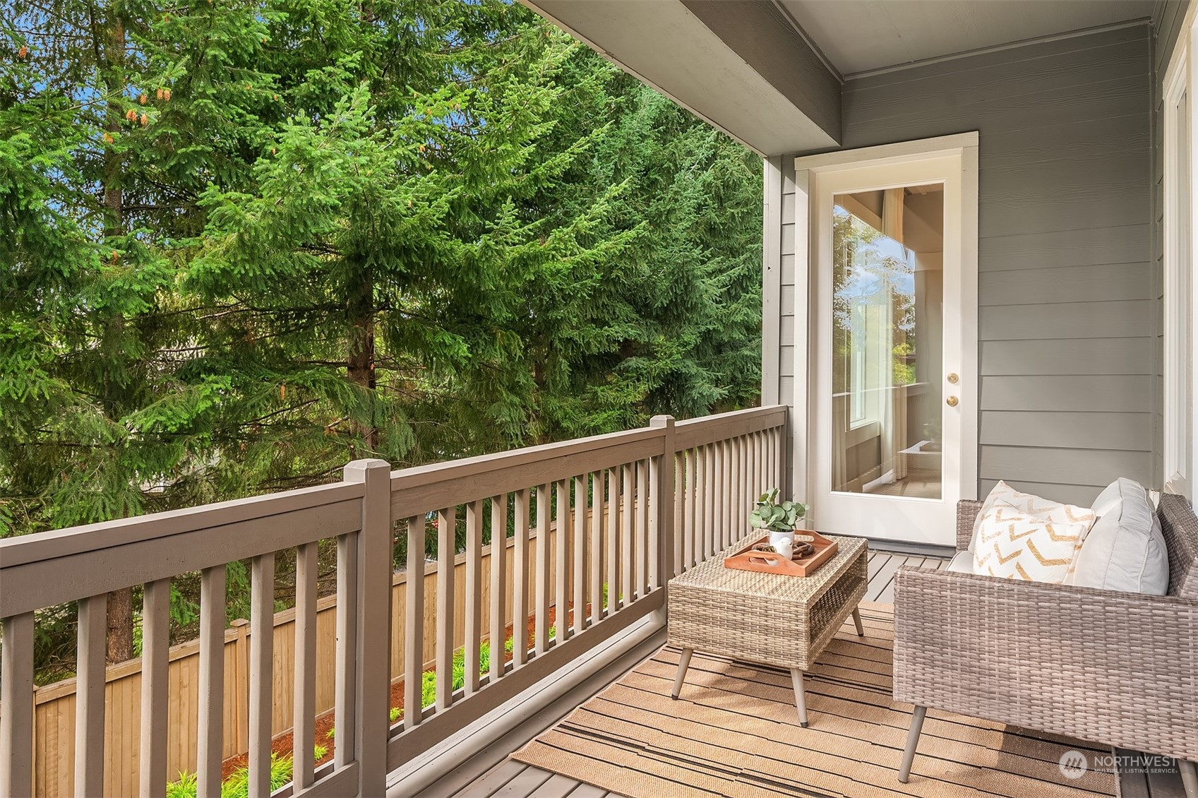 611 Field Place Northeast Renton, WA 98059 - Photo 14 of 36 a roof deck with a table and chairs