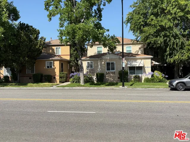 front view of a house with a street
