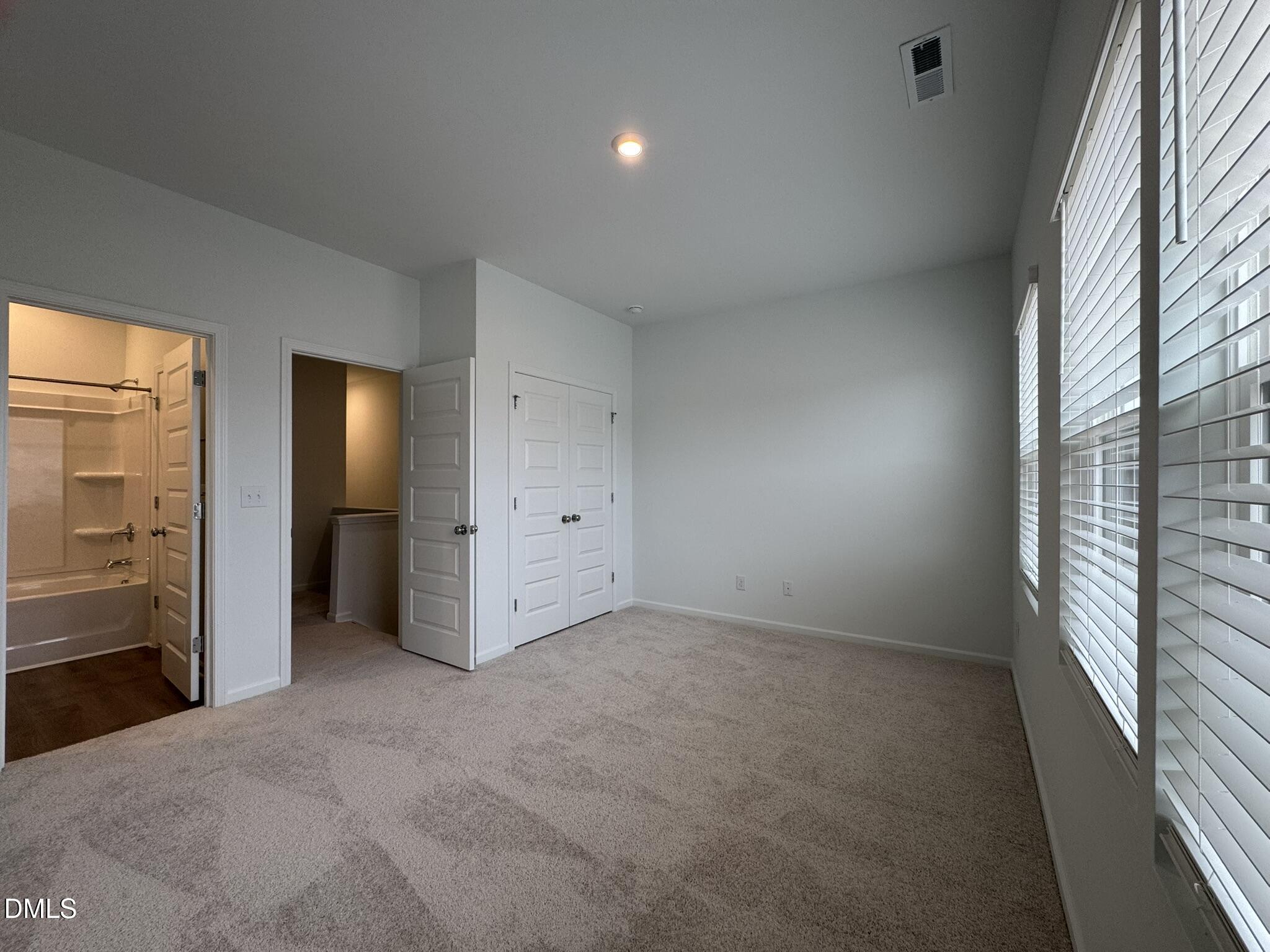3312 Bomore Road Raleigh, NC 27610 - Photo 12 of 20 an empty room with windows