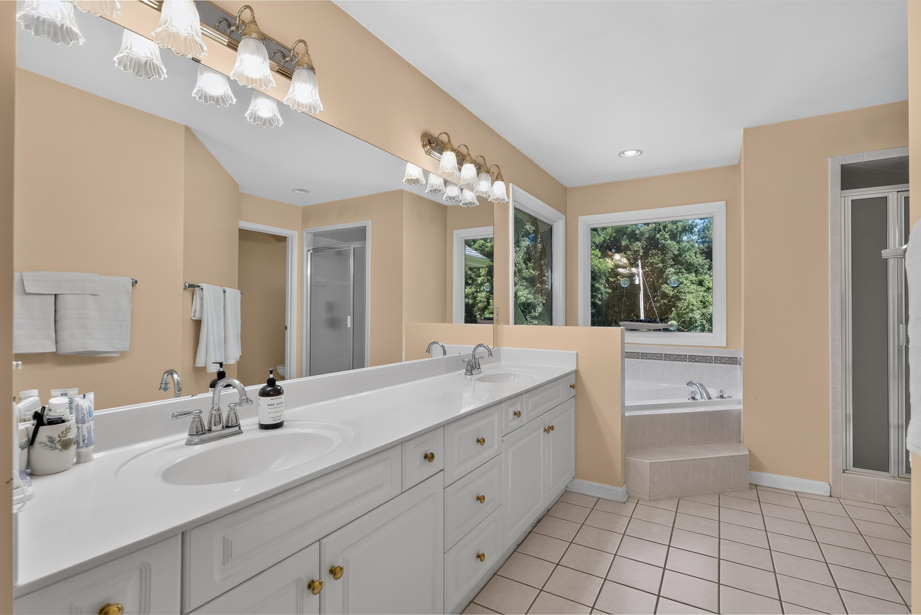 3942 Petersburg Road Burlington, KY 41005 - Photo 27 of 50 Primary bath features double vanity, tile floors, jetted tub, walk-in shower and private water closet