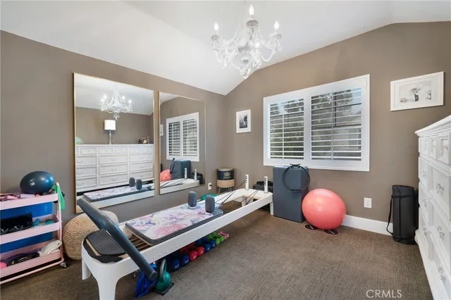 a bathroom with a sink a toilet and shower curtain