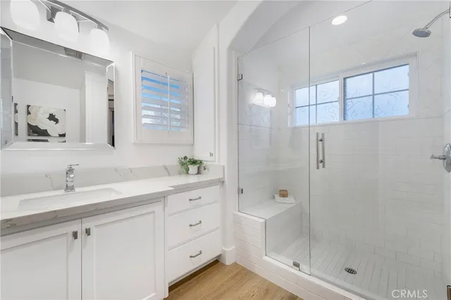 a view of a bathroom from a hallway