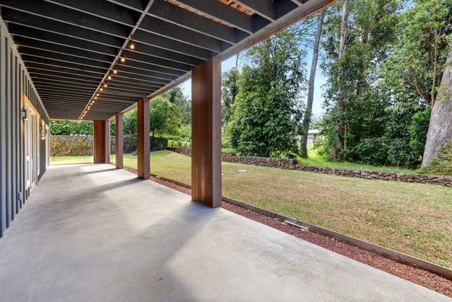 a view of porch with green space