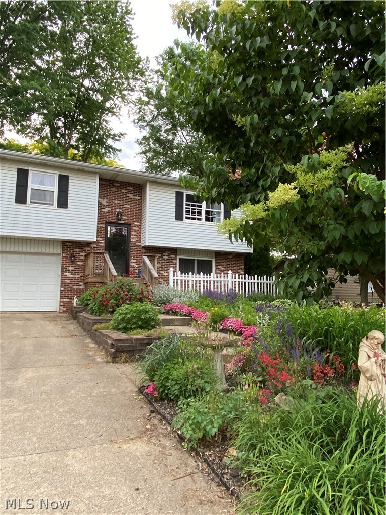 2587 Smith Road Akron, OH 44333 - Photo 1 of 30 Beautiful front entrance with tons of lush perennials