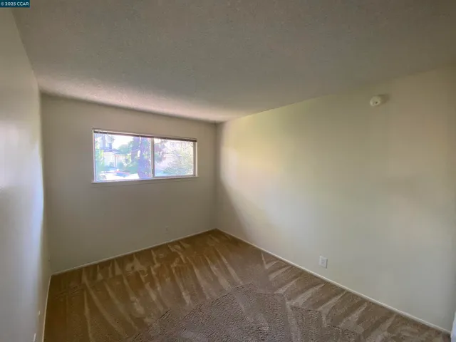 a view of a room with a window