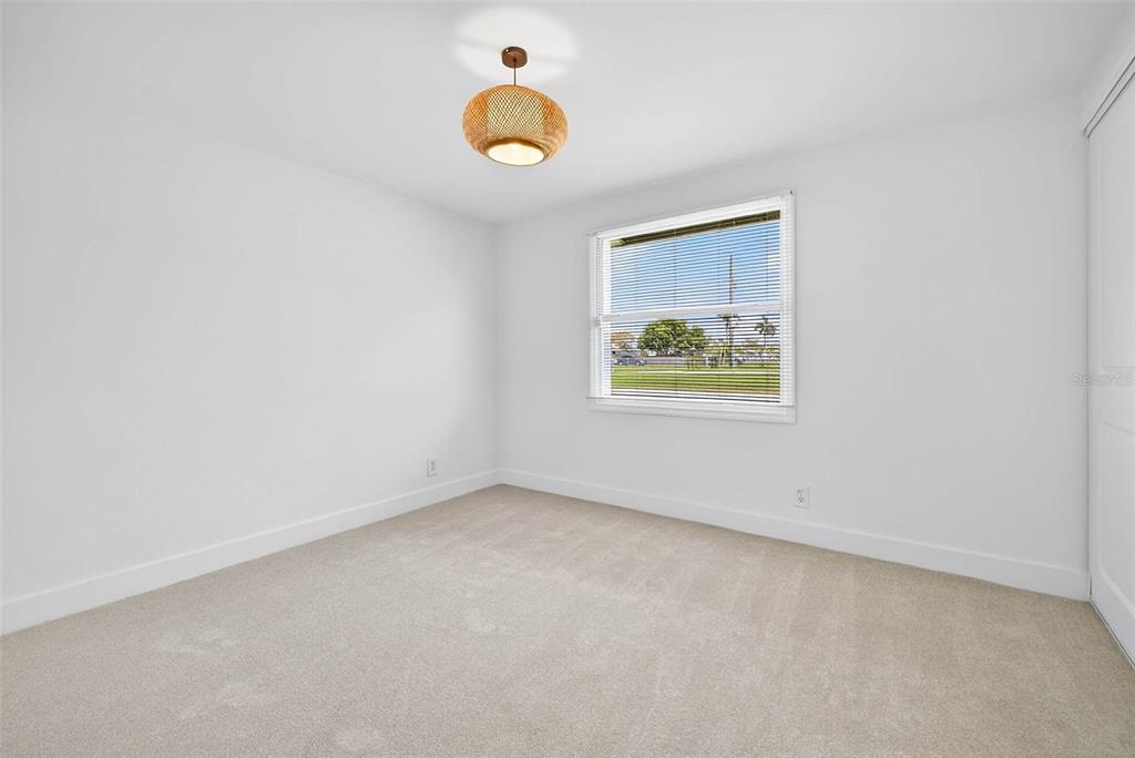 3225 West Shell Point Road Ruskin, FL 33570 - Photo 19 of 57 an empty room with a window