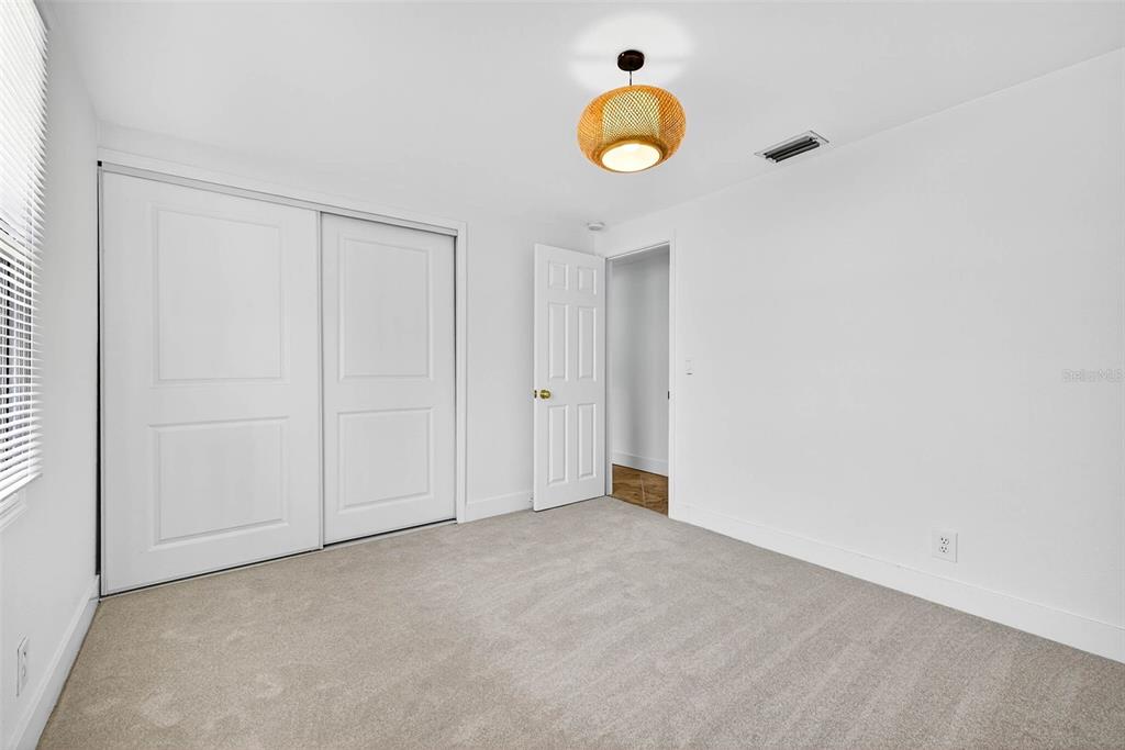 3225 West Shell Point Road Ruskin, FL 33570 - Photo 20 of 57 a view of an empty room and a window