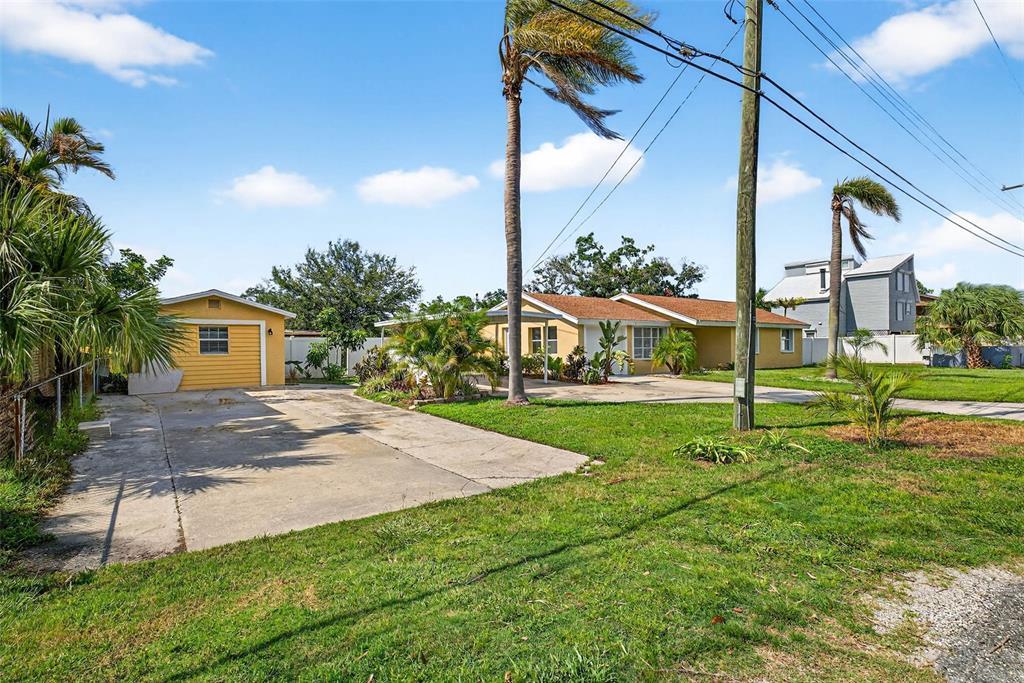 3225 West Shell Point Road Ruskin, FL 33570 - Photo 2 of 57 a view of a house with a yard