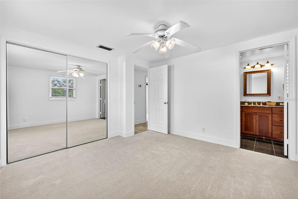 3225 West Shell Point Road Ruskin, FL 33570 - Photo 25 of 57 a view of an empty room with a bathroom