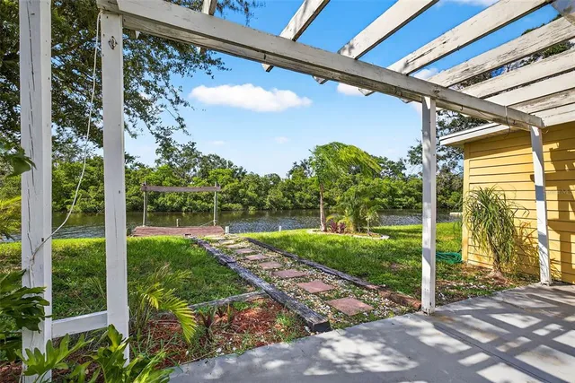 a view of a terrace with sitting area