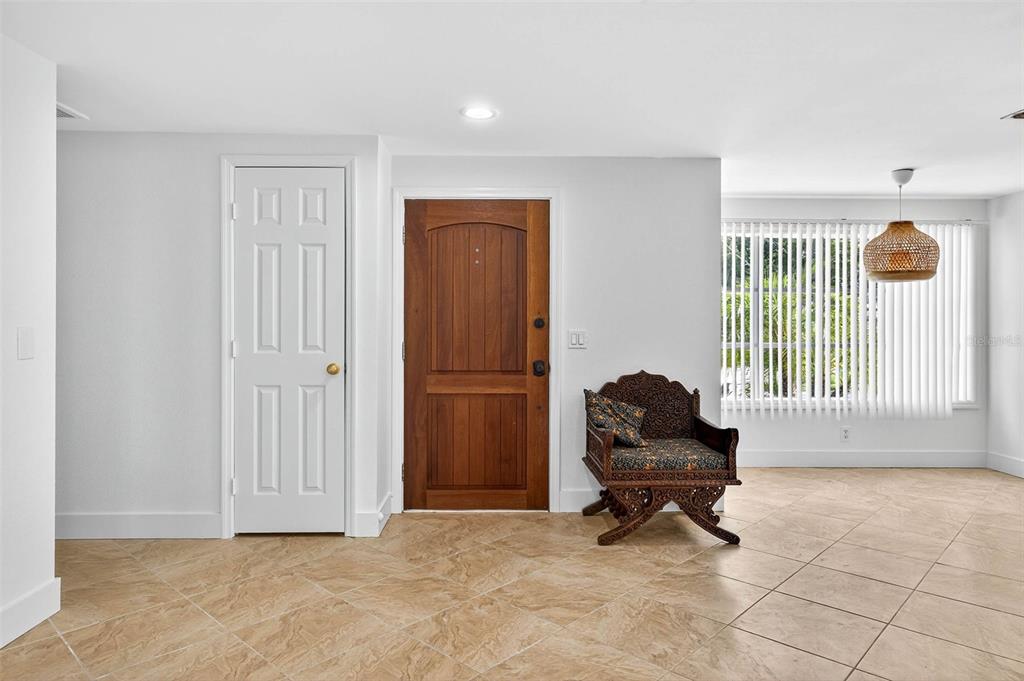 3225 West Shell Point Road Ruskin, FL 33570 - Photo 5 of 57 a living room with furniture and a window