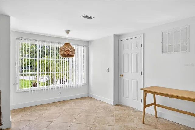 a kitchen with stainless steel appliances granite countertop a sink and a granite counter tops