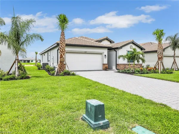 a house view with a garden space