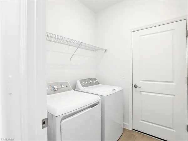 a view of a room with rack on the wall