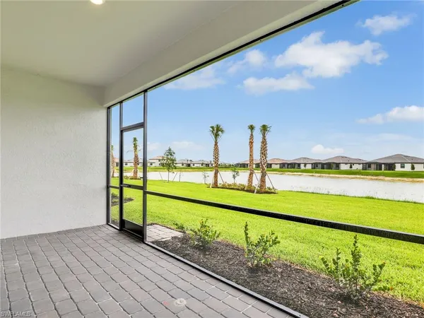 a view of a lake with a big yard