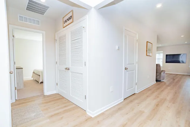 a view of a swimming pool with a table and chairs