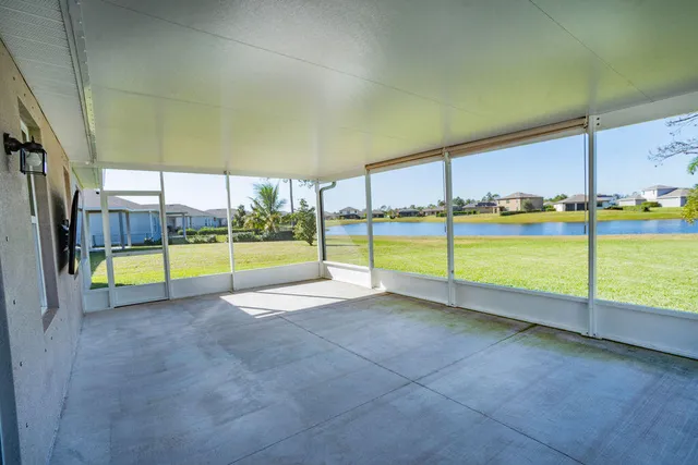 a view of an outdoor space and tennis court