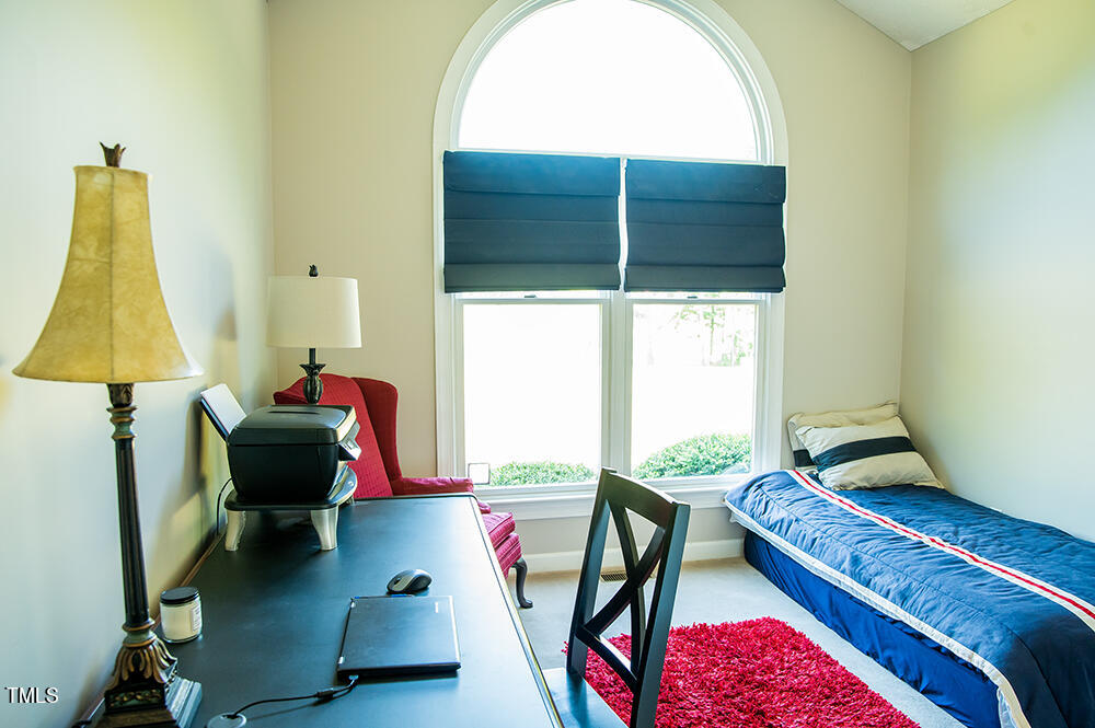 6044 Dirgie Mine Road Roxboro, NC 27574 - Photo 54 of 74 a living room with furniture and a large window