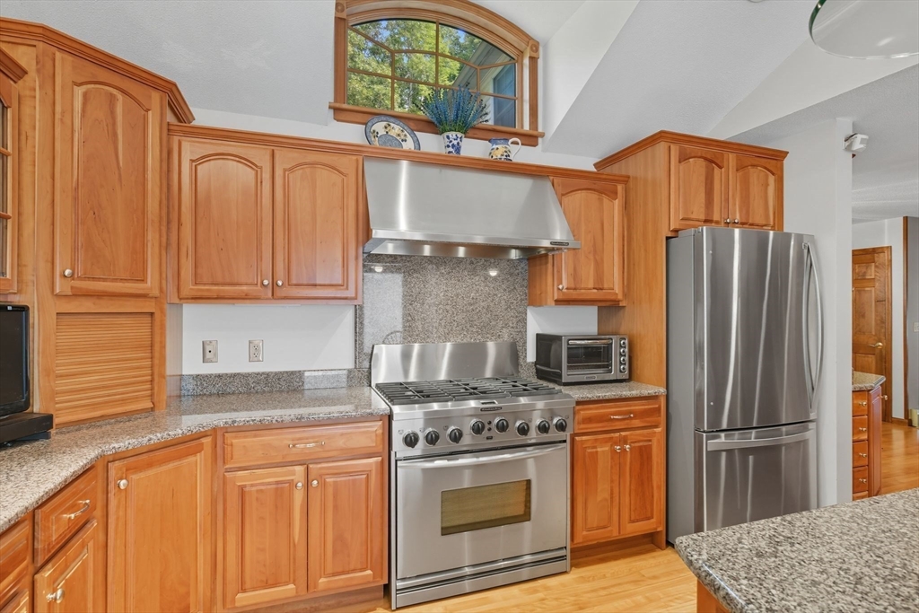 201 Belchertown Road Ware, MA 01082 - Photo 15 of 42 a kitchen with stainless steel appliances granite countertop a refrigerator stove and sink