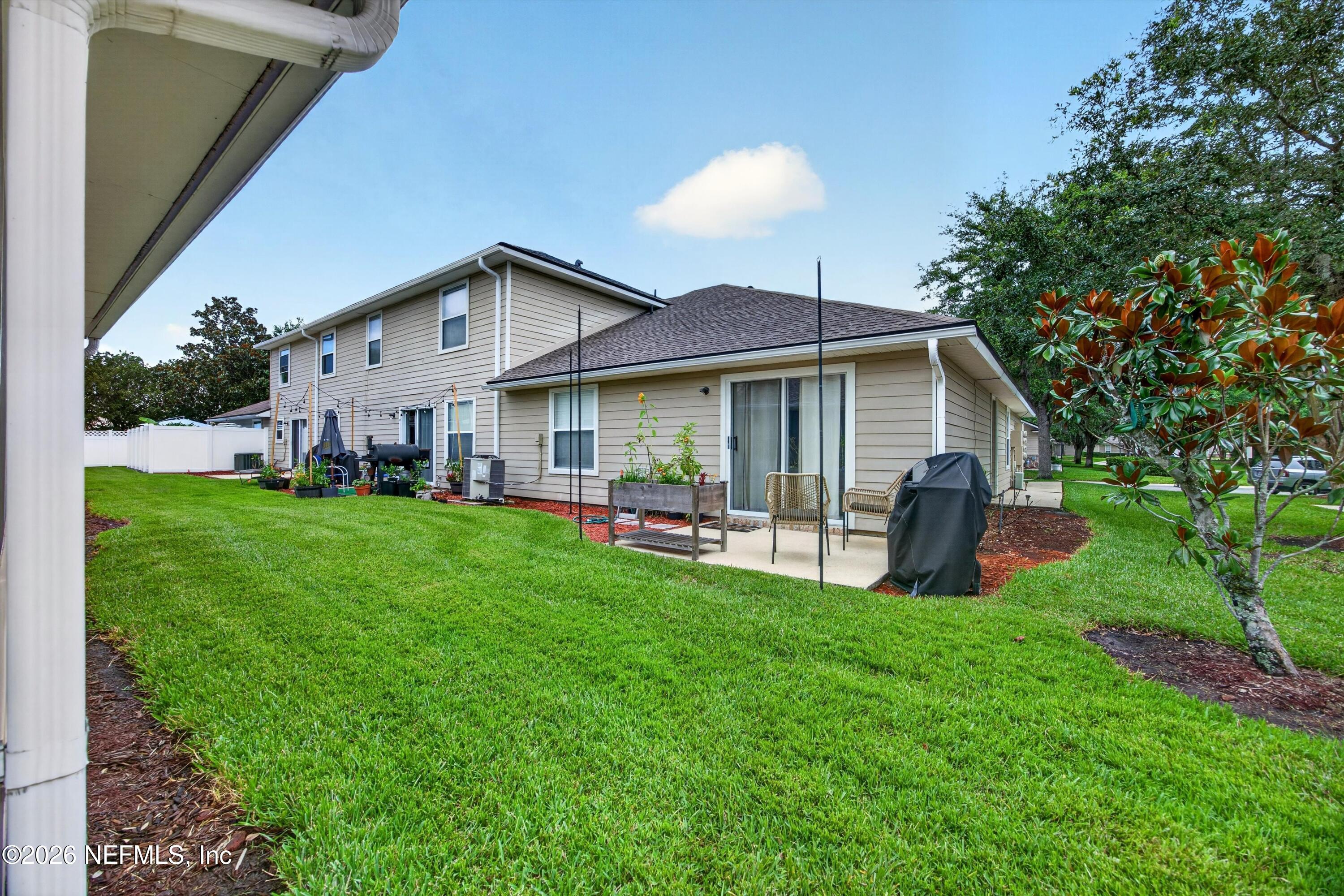 605 North Covered Bridge Road, Unit 4 St. Johns, FL 32259 - Photo 17 of 31 Patio view into Backyard