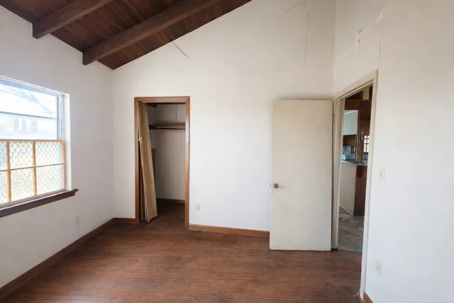 an empty room with windows