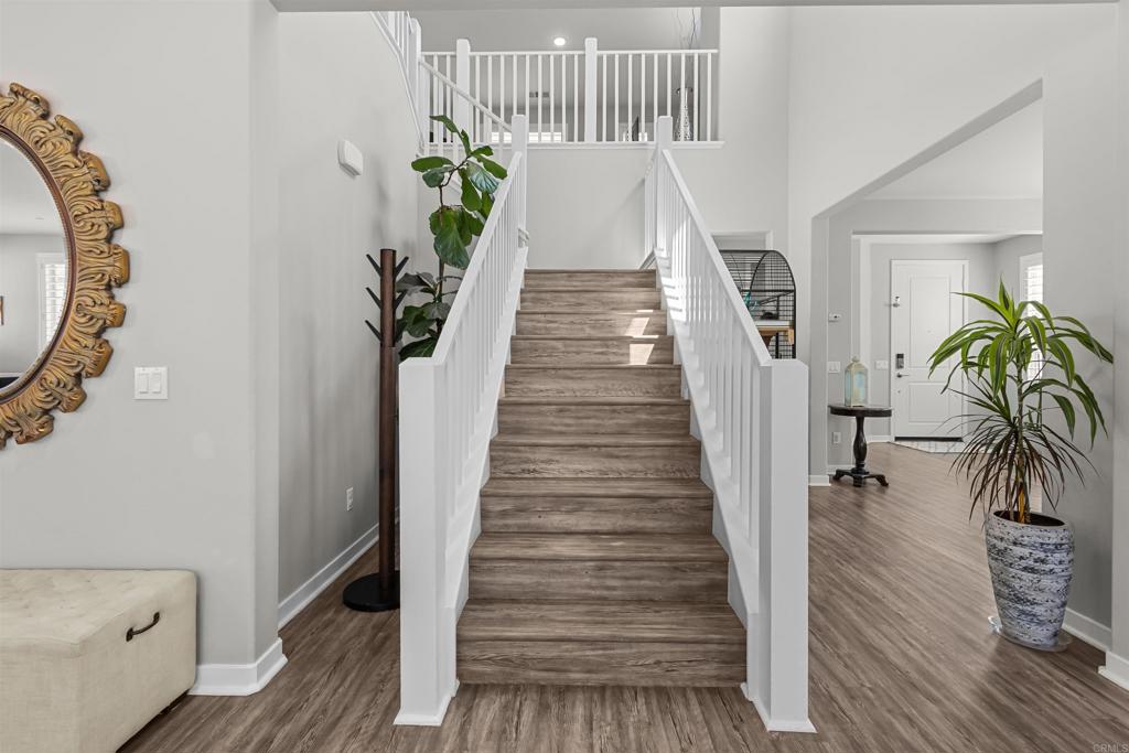 29809 Gypsy Vanner Way Menifee, CA 92584 - Photo 21 of 45 a view of entryway with wooden floor