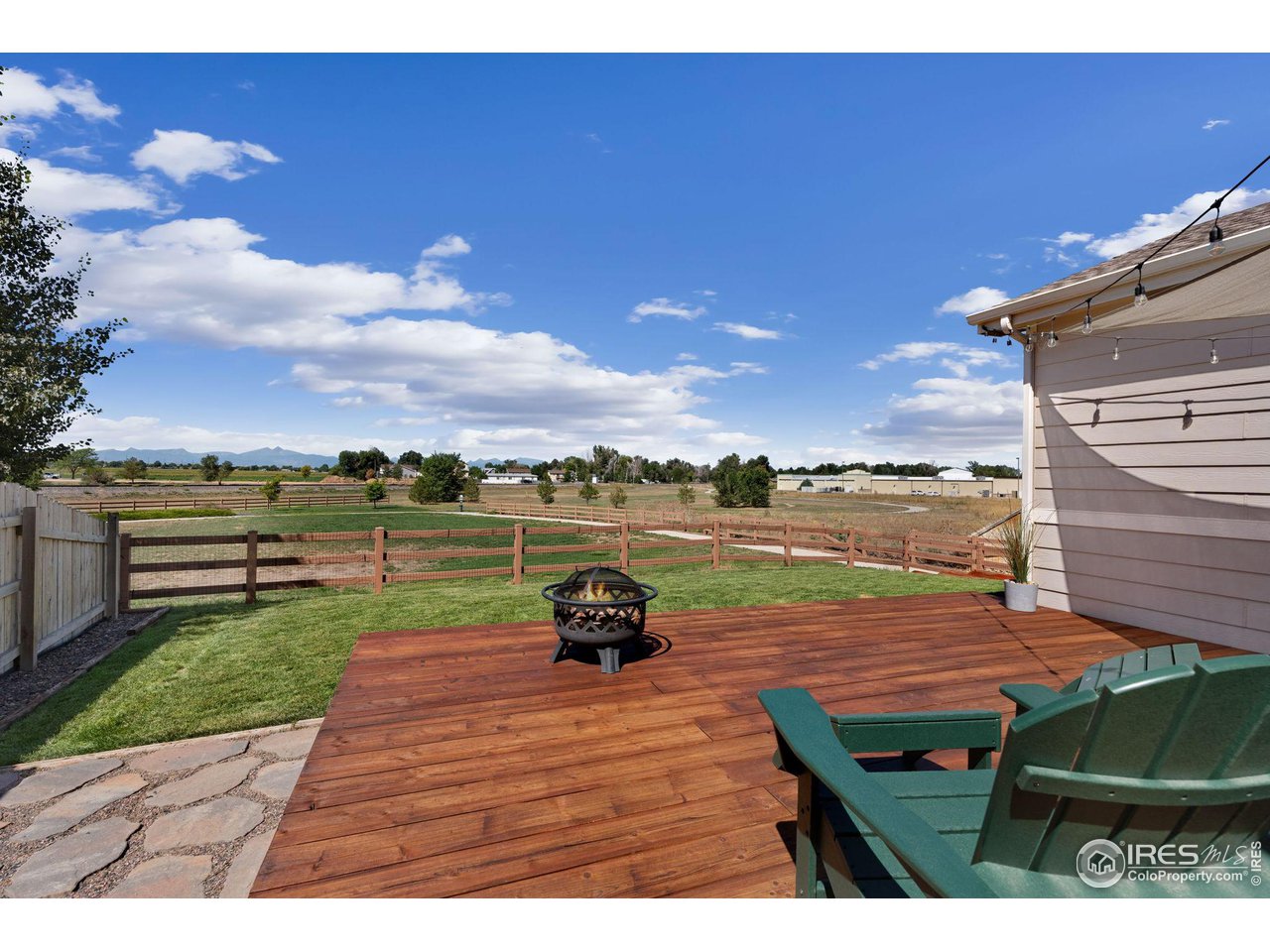 1833 Sunset Circle Milliken, CO 80543 - Photo 13 of 21 a view of a ocean from a terrace