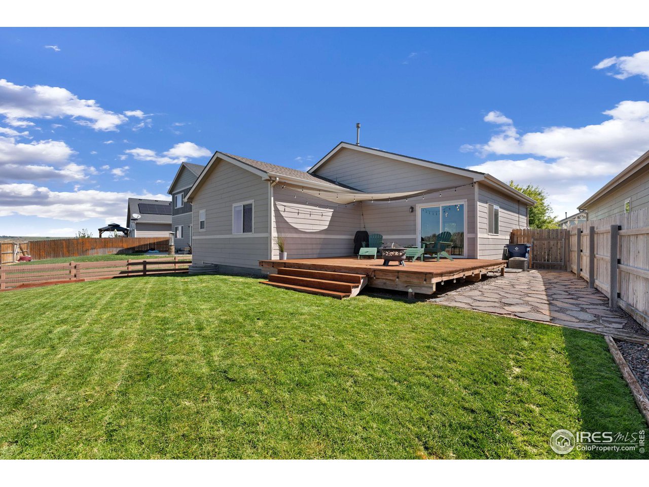 1833 Sunset Circle Milliken, CO 80543 - Photo 15 of 21 a house view with a garden space