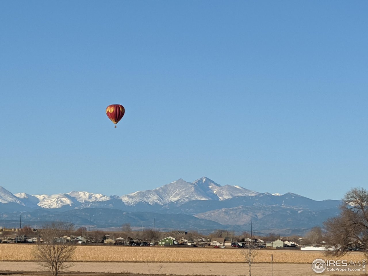 1833 Sunset Circle Milliken, CO 80543 - Photo 16 of 21 a view of a sky from a terrace