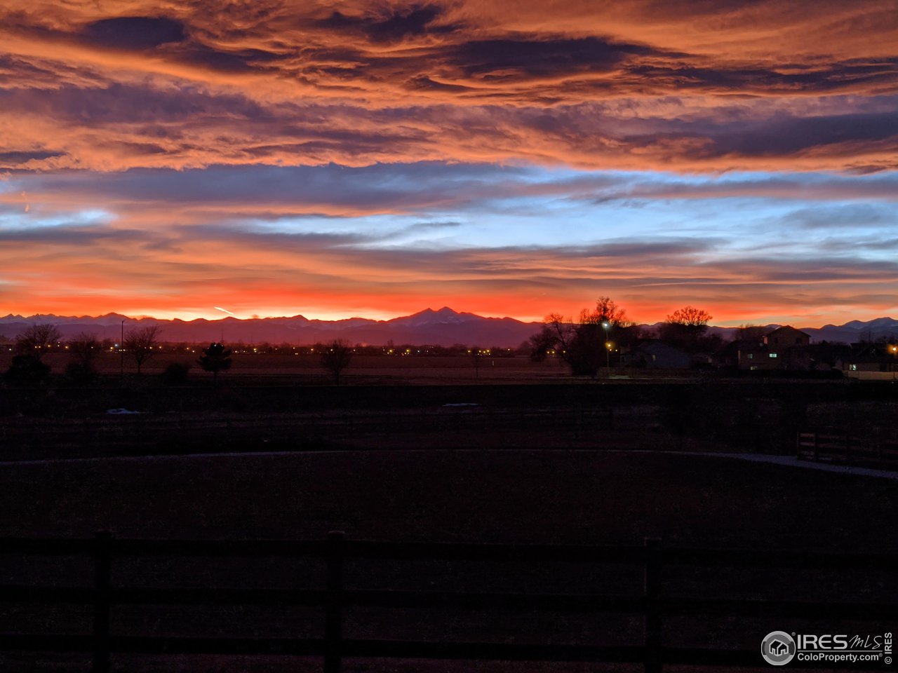 1833 Sunset Circle Milliken, CO 80543 - Photo 17 of 21 a view of lake with mountain