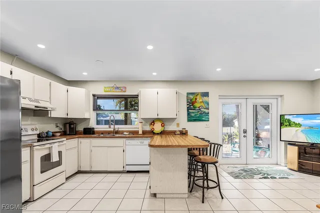 a bedroom with a bed and a desk