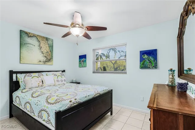 a bathroom with a toilet sink and shower