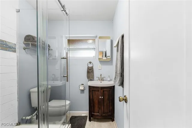 a front view of a house with outdoor seating