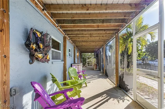 a view of a garage with parked cars
