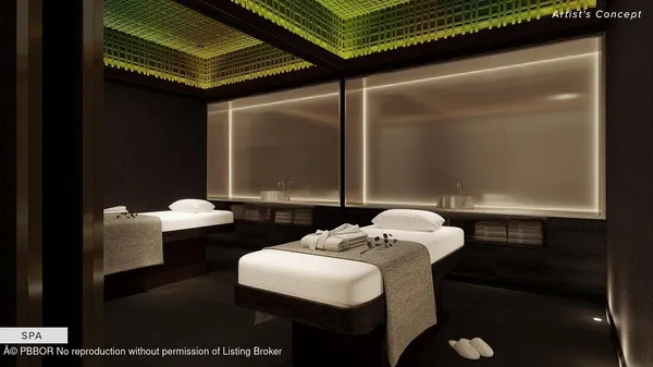 a room with lots of chairs and mirrors