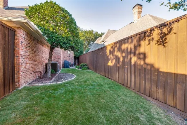 a view of a backyard with plants