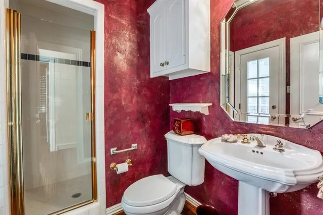 a kitchen with refrigerator and window