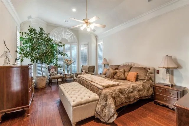 a large bathroom with a granite countertop double vanity sink and a mirror