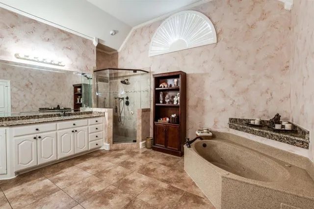 a room with pool table and windows