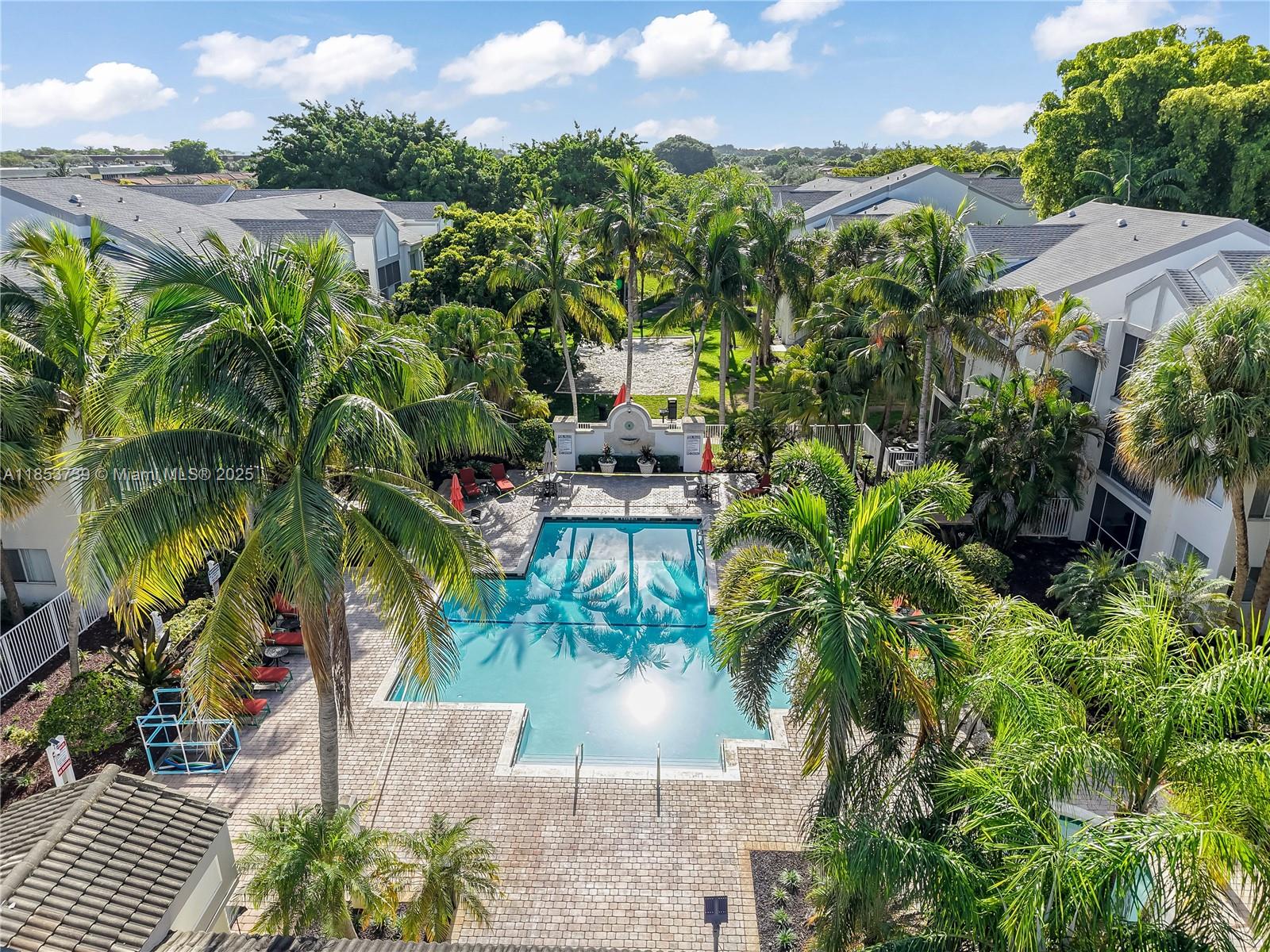 5686 Rock Island Road, Unit 106 Tamarac, FL 33319 - Photo 1 of 34 a view of a yard and plants