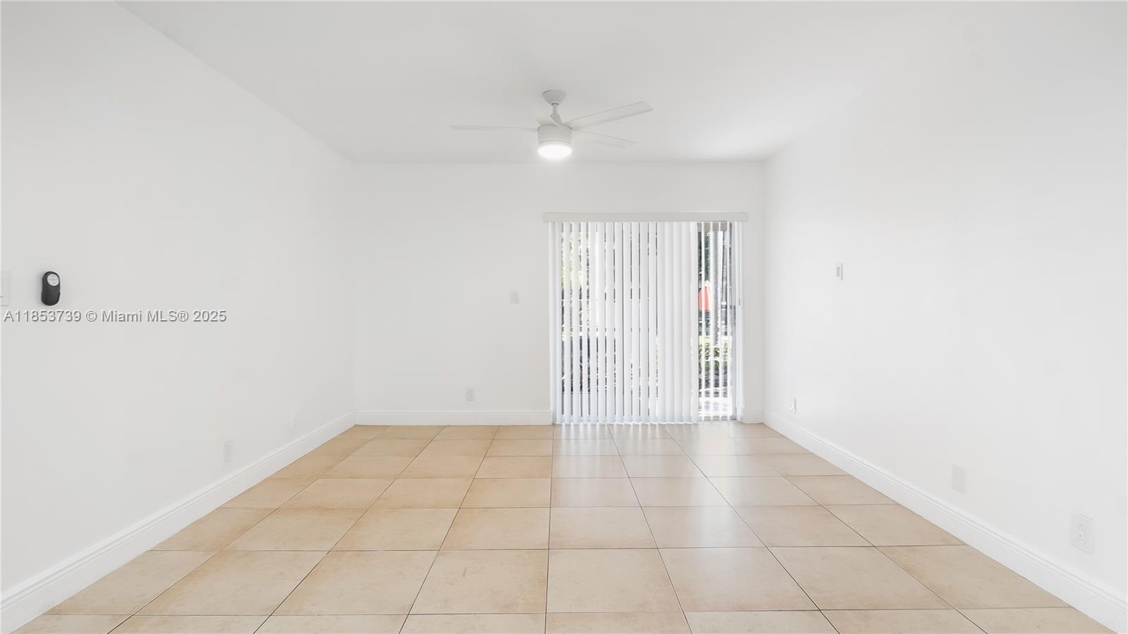 5686 Rock Island Road, Unit 106 Tamarac, FL 33319 - Photo 16 of 34 a view of an empty room