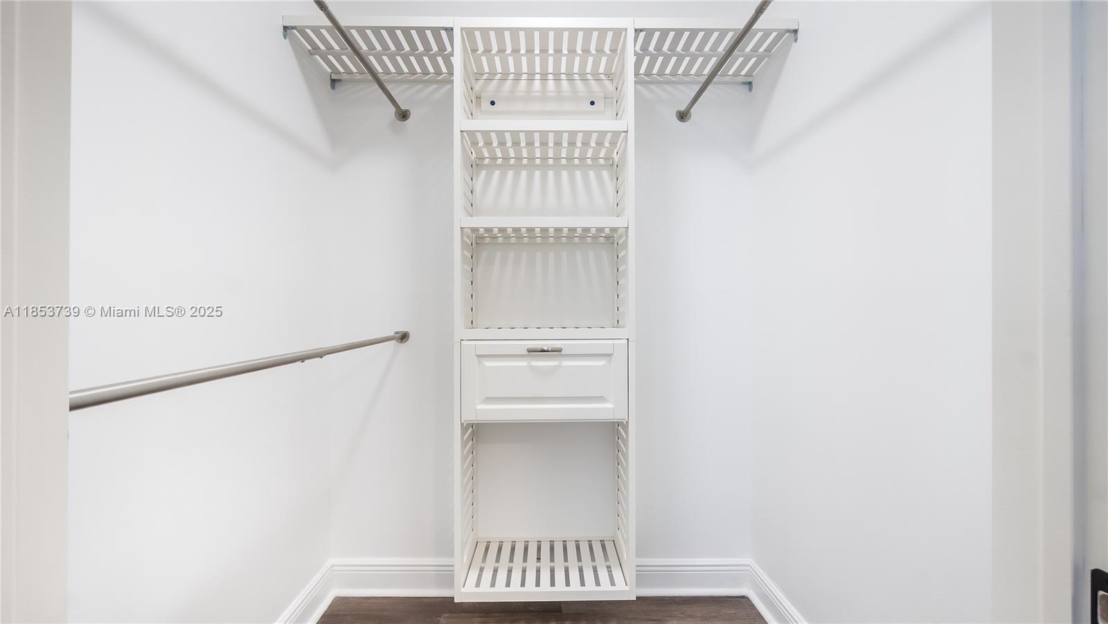 5686 Rock Island Road, Unit 106 Tamarac, FL 33319 - Photo 23 of 34 a view of a hallway with white walls