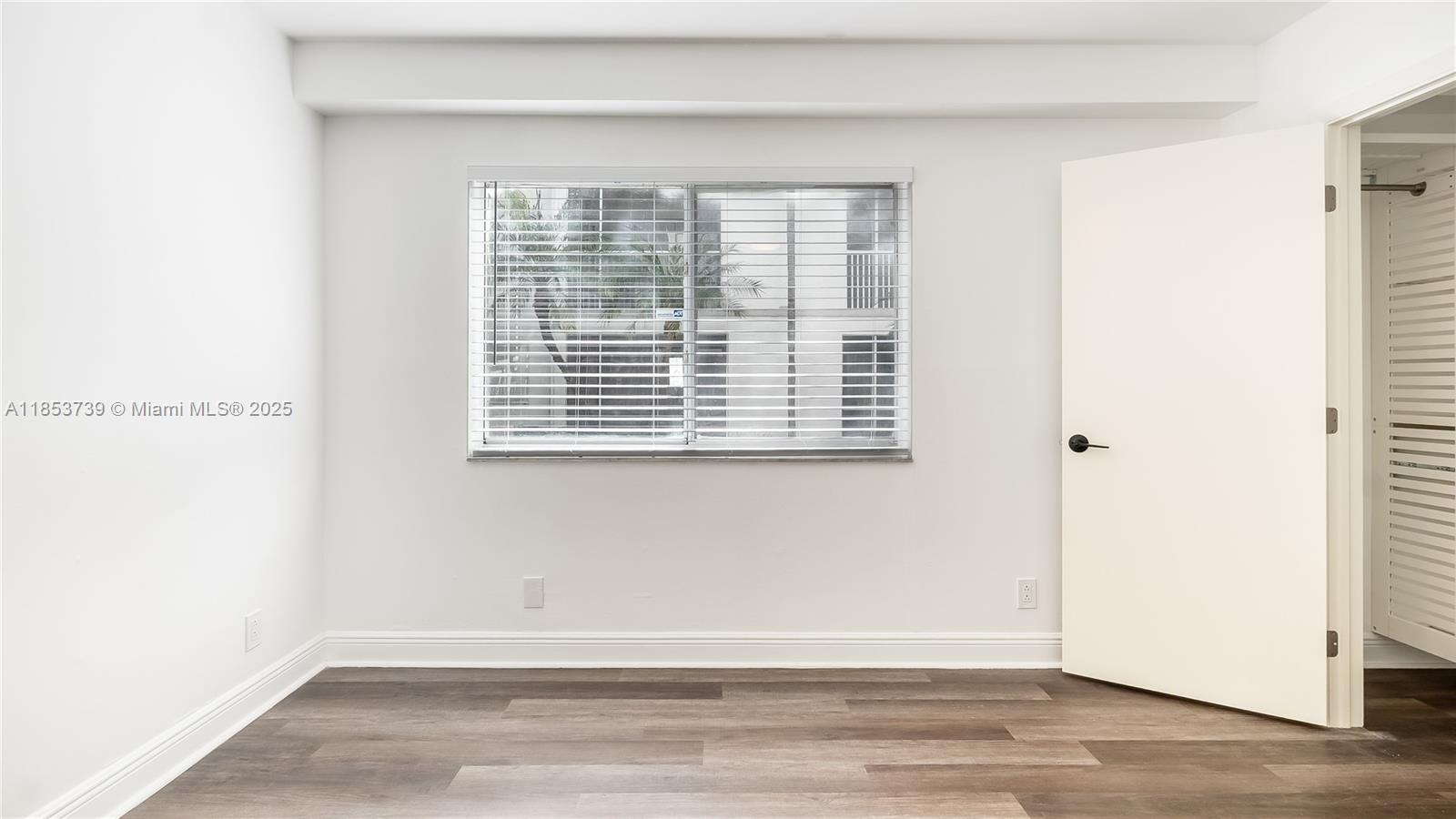 5686 Rock Island Road, Unit 106 Tamarac, FL 33319 - Photo 26 of 34 a view of a room that has a window in it